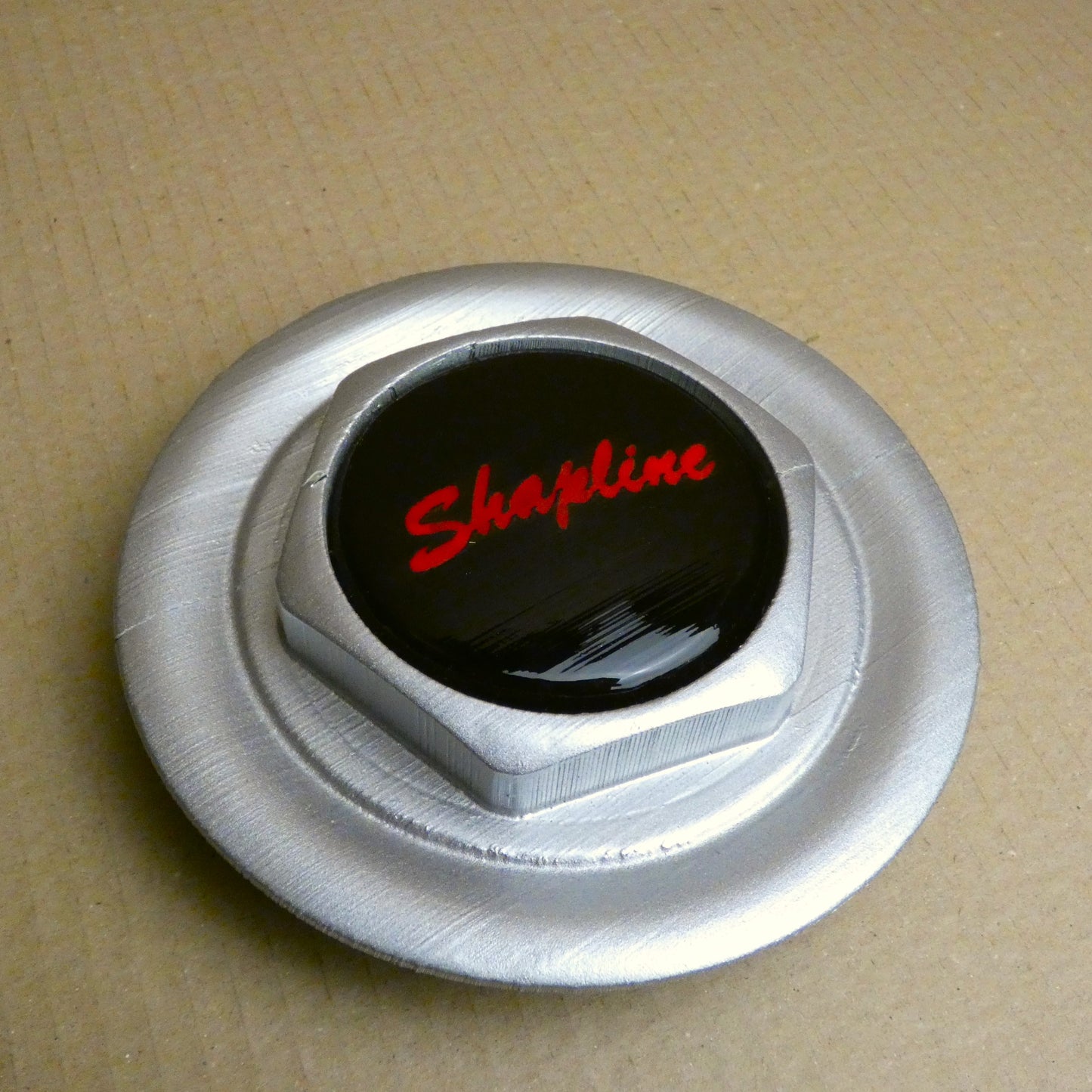 Capuchon de centre de roue badgé Shapline 70mm (STL)
